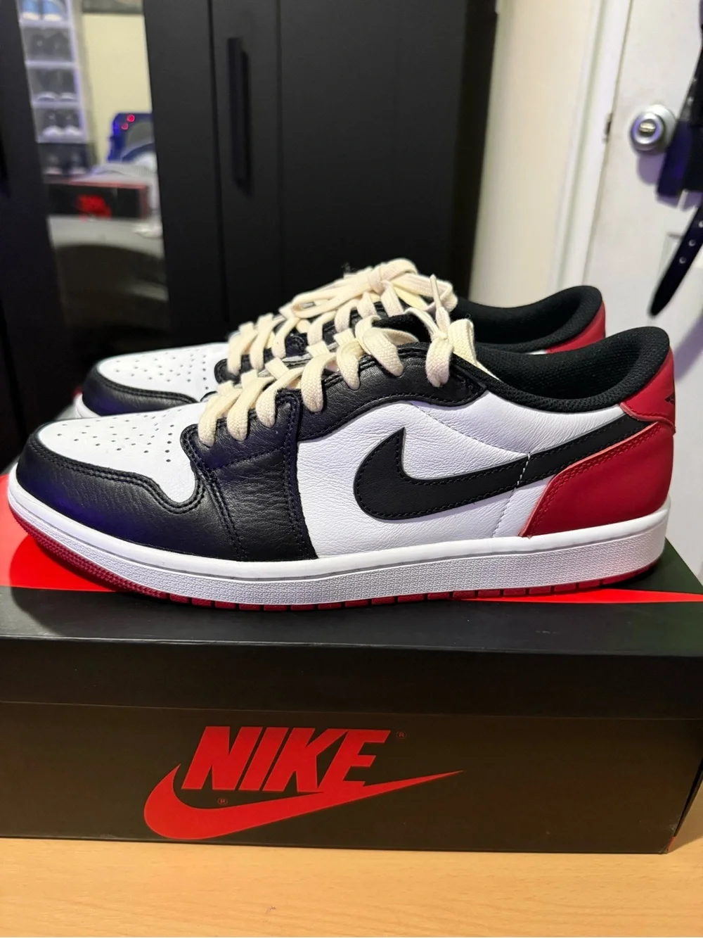 Jordan Low Top Sneakers in Black, White, Red